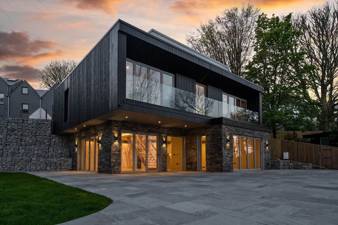 St Ives style coastal home with warm evening lighting